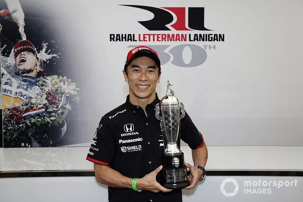 2020 Indy 500 winner Takuma Sato is presented with the Baby Borg-Warner Trophy