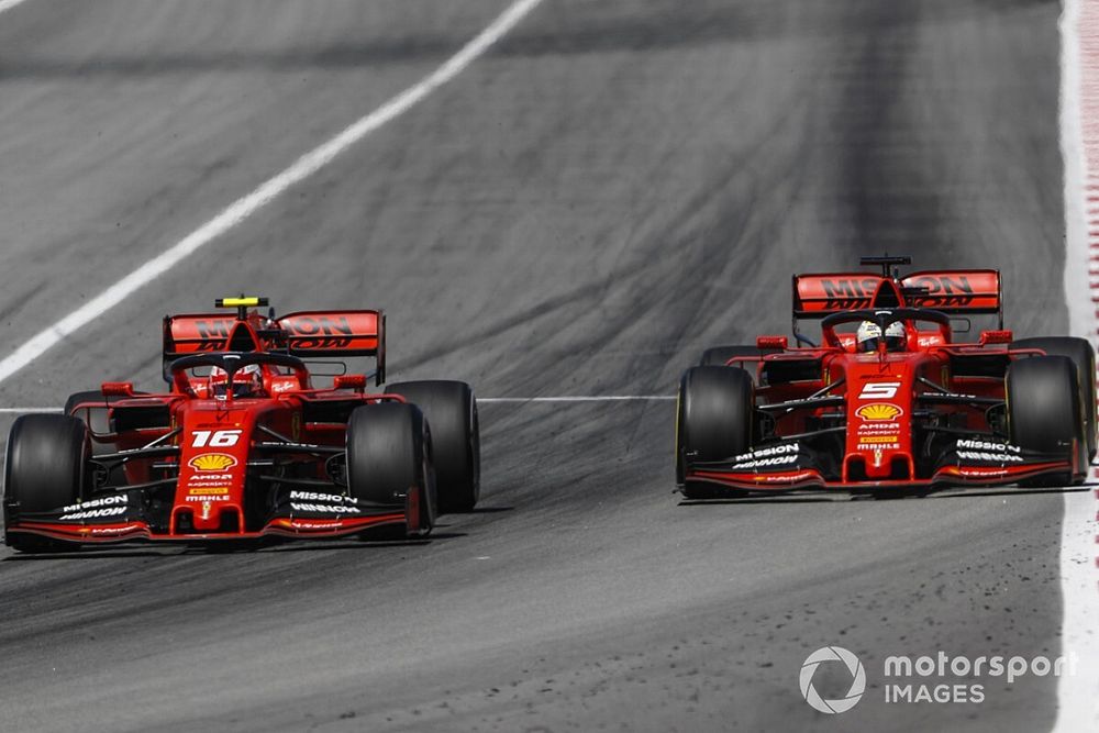 Charles Leclerc, Ferrari SF90, leads Sebastian Vettel, Ferrari SF90