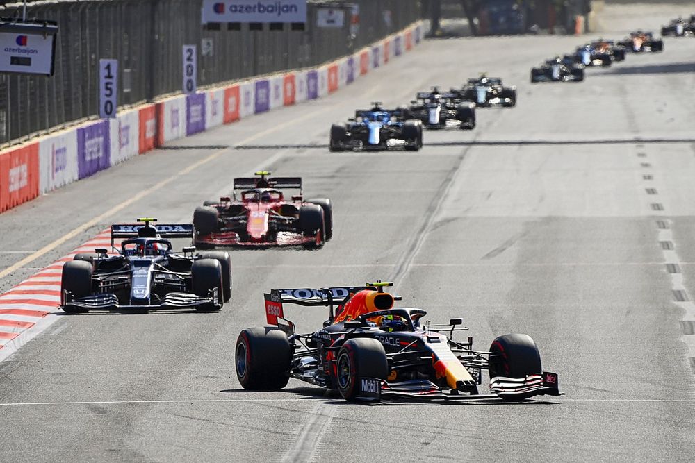 Sergio Perez, Red Bull Racing RB16B, Pierre Gasly, AlphaTauri AT02, and Carlos Sainz Jr., Ferrari SF21