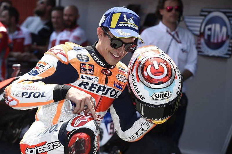 Marc Marquez, Repsol Honda Team, pointing at scratched knee