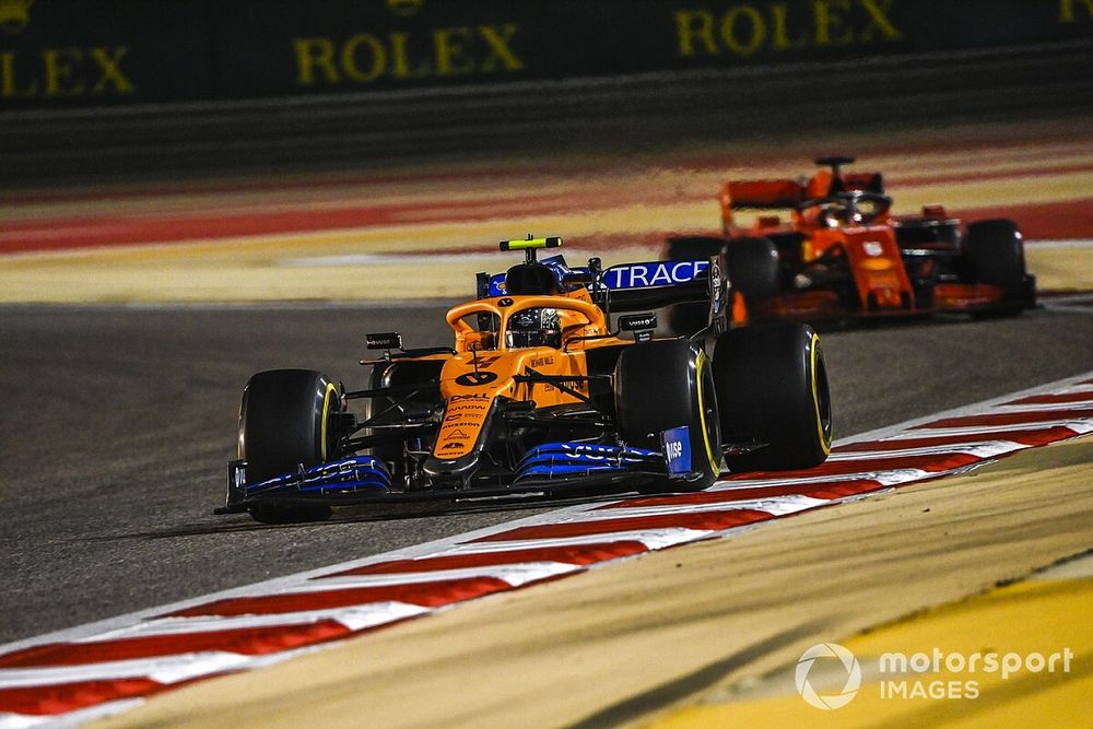 Lando Norris, McLaren MCL35, Sebastian Vettel, Ferrari SF1000