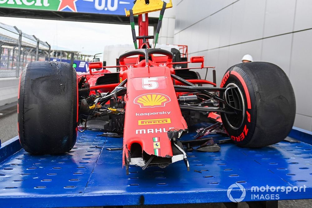 The damaged car of Sebastian Vettel, Ferrari SF1000, on a truck