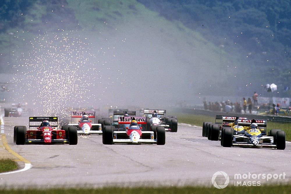 Riccardo Patrese, Williams FW12C Renault leads Ayrton Senna, McLaren MP4/5 Honda who has Gerhard Berger, Ferrari 640 going down his inside at the start