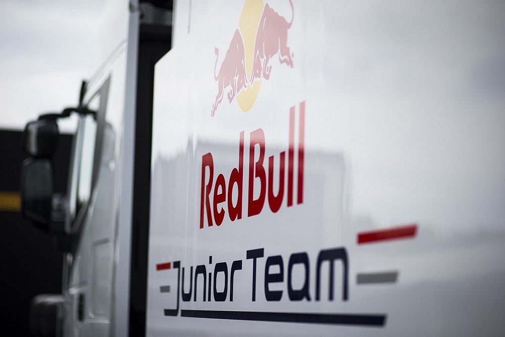 Red Bull Junior Team' logo on side of PREMA Racing truck