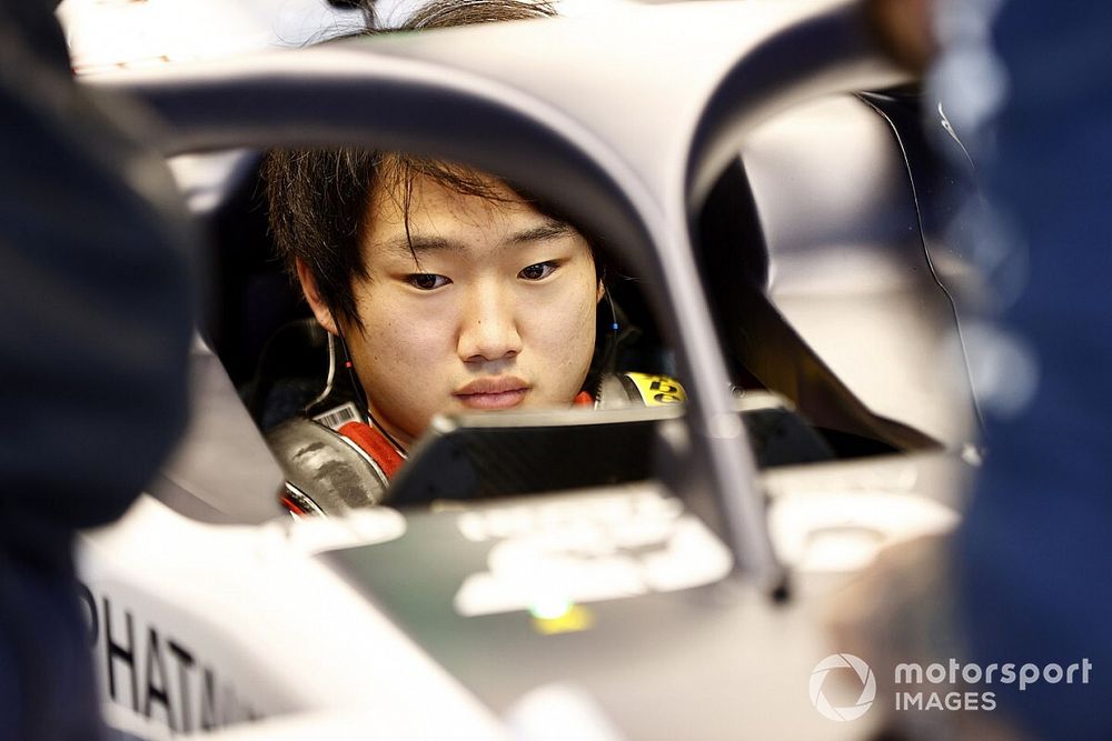 Yuki Tsunoda, Honda Formula Dream Project sits in his car in the garage