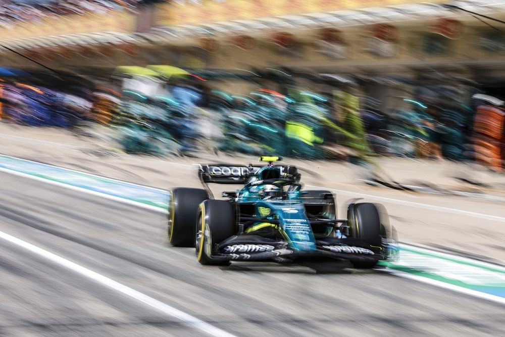 Sebastian Vettel, Aston Martin AMR22, leaves his pit box after a stop