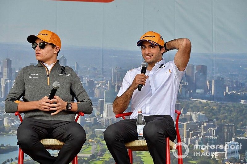 Lando Norris, McLaren, and Carlos Sainz Jr., McLaren, on stage