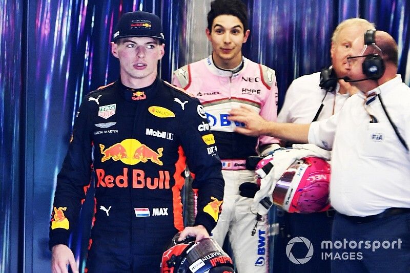 Max Verstappen, Red Bull Racing and Esteban Ocon, Racing Point Force India square up after the race following their on track crash 