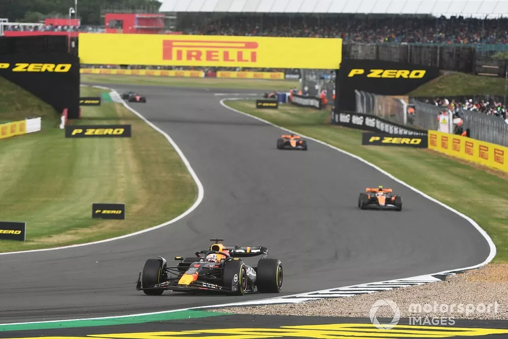Max Verstappen, Red Bull Racing RB19, leads Lando Norris, McLaren MCL60, Oscar Piastri, McLaren MCL60, and Oscar Piastri, McLaren MCL60