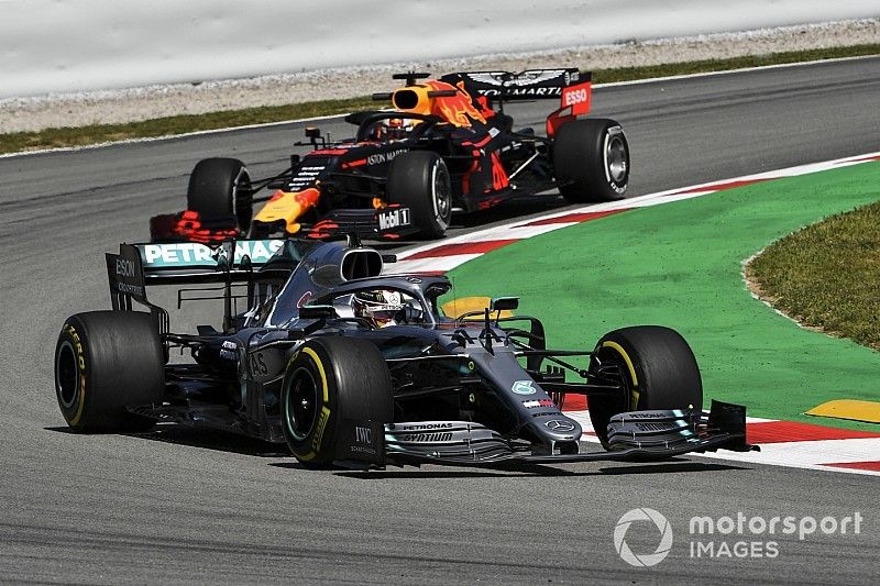 Lewis Hamilton, Mercedes AMG F1 W10, leads Max Verstappen, Red Bull Racing RB15