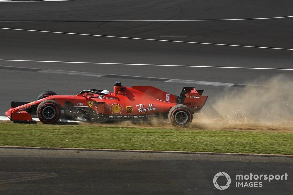 Sebastian Vettel, Ferrari SF1000, kicks up dust and sparks