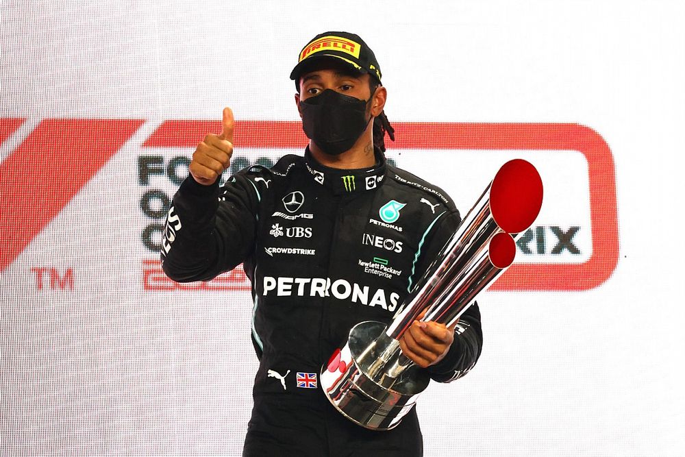 Lewis Hamilton, Mercedes, 1st position, with his trophy