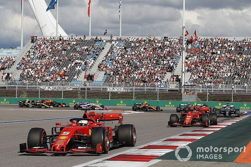 Sebastian Vettel, Ferrari SF90, leads Charles Leclerc, Ferrari SF90, Lewis Hamilton, Mercedes AMG F1 W10, Carlos Sainz Jr., McLaren MCL34, Valtteri Bottas, Mercedes AMG W10 and Lando Norris, McLaren MCL34 at the start