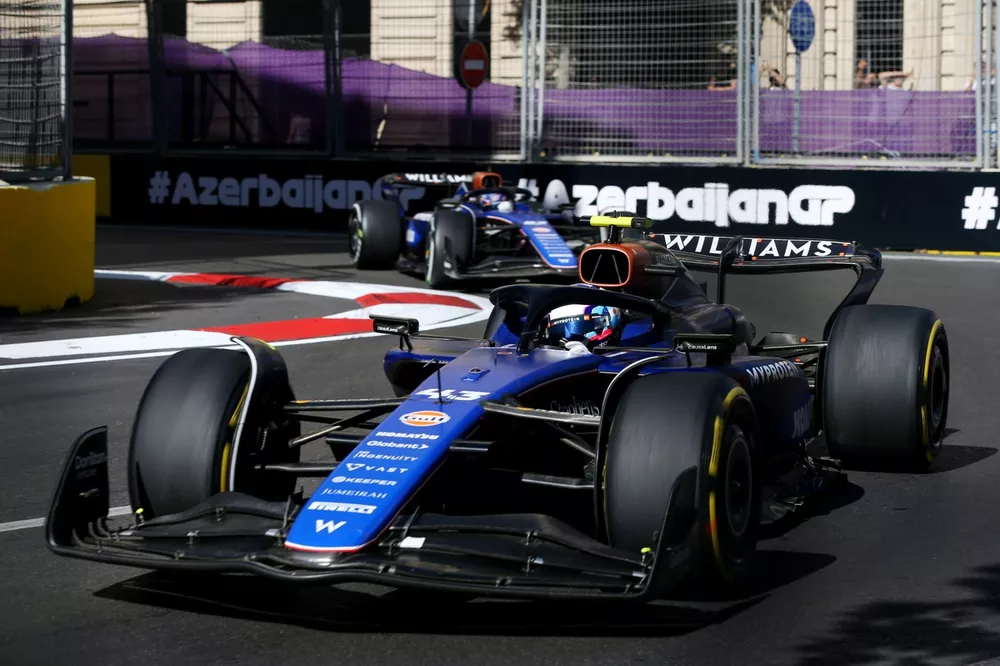 Franco Colapinto, Williams FW46, leads Alex Albon, Williams FW46
