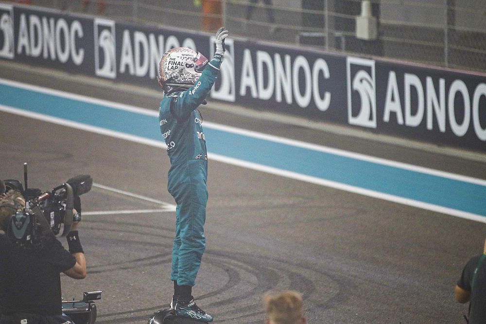 Sebastian Vettel, Aston Martin, waves from the grid at the end of his final race in F1