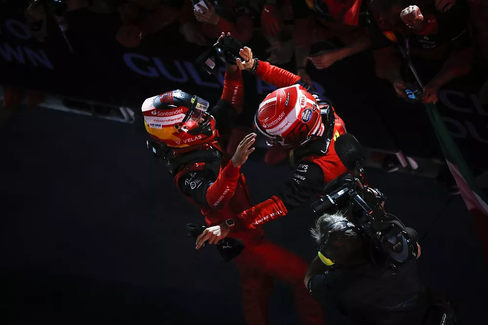 Charles Leclerc, Ferrari, 1st position, Carlos Sainz Jr., Ferrari, 2nd position, celebrate in Parc Ferme