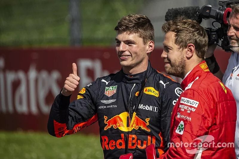 Racewinnaar Max Verstappen, Red Bull Racing en Sebastian Vettel, Ferrari in parc ferme