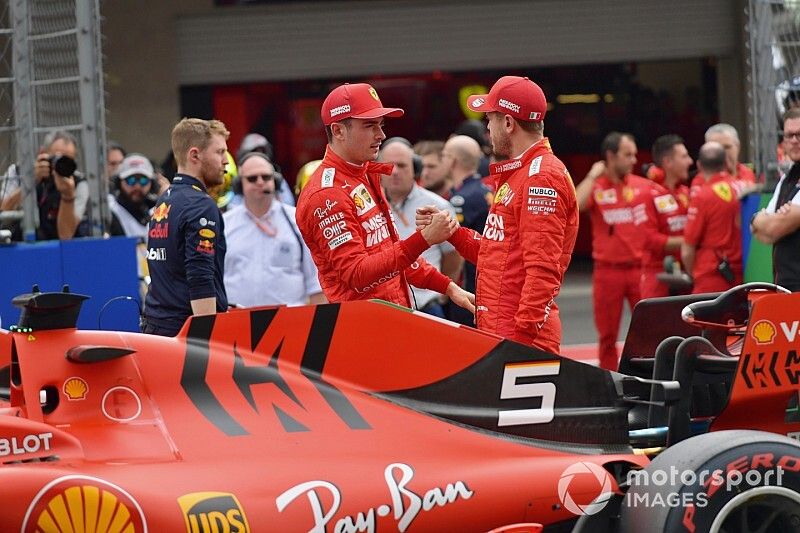 Charles Leclerc, Ferrari, and Sebastian Vettel, Ferrari, congratulate each other after Qualifying