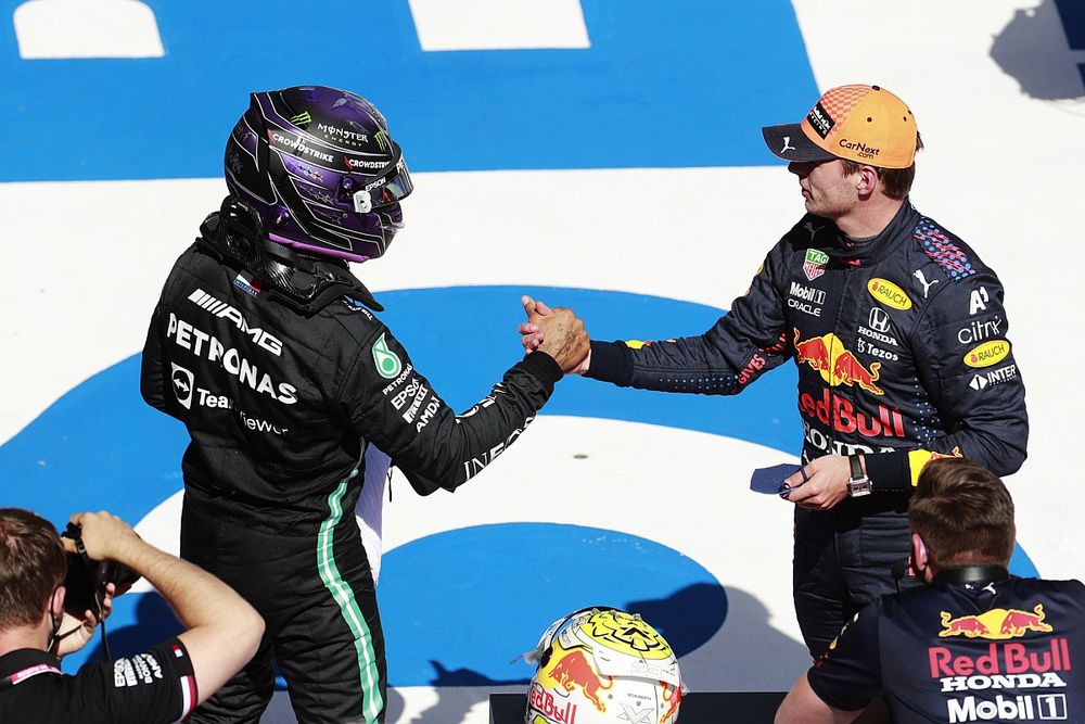 Lewis Hamilton, Mercedes, congratulates pole man Max Verstappen, Red Bull Racing, in Parc Ferme