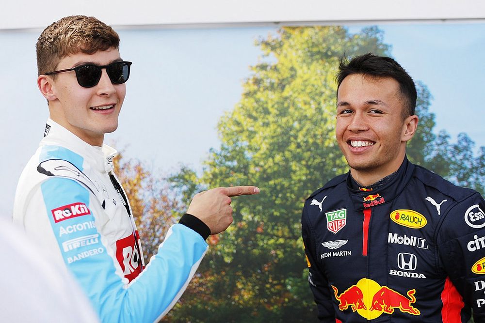 George Russell, Williams Racing, with Alex Albon, Red Bull Racing