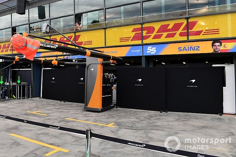Screens outside the McLaren garage