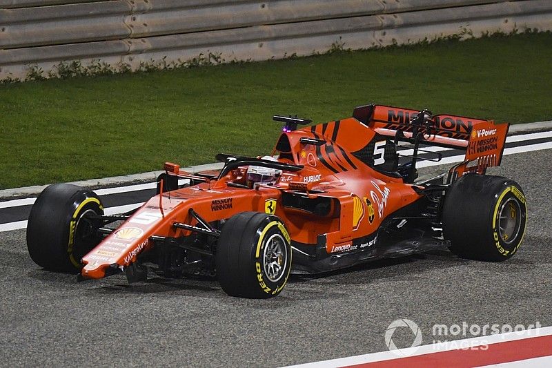 Sebastian Vettel, Ferrari SF90, heads to the pits with a broken front wing