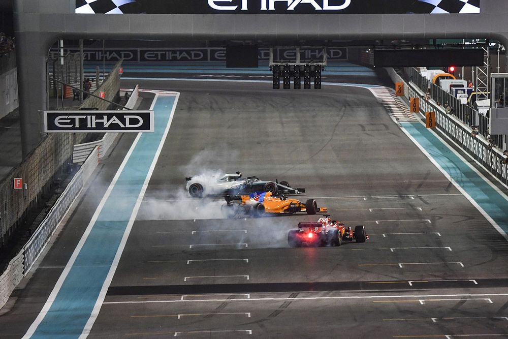 Lewis Hamilton, Mercedes-AMG F1 W09, Sebastian Vettel, Ferrari SF71H and Fernando Alonso, McLaren MCL33 celebrate with donuts at the end of the race 