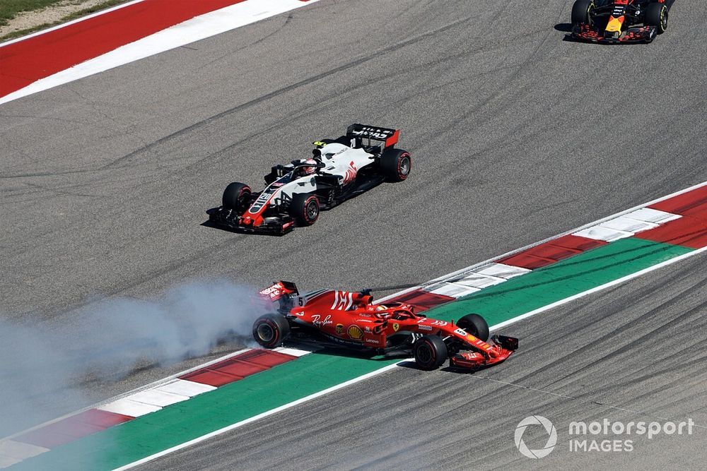 Sebastian Vettel, Ferrari SF71H spins after contact with Daniel Ricciardo, Red Bull Racing RB14 