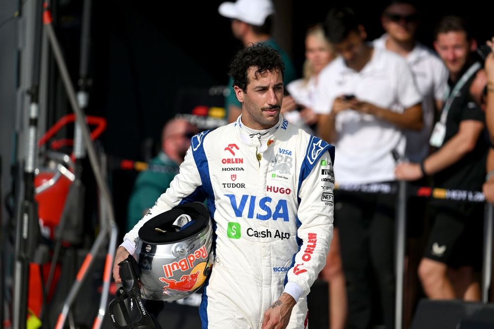 Daniel Ricciardo, Visa Cash App RB F1 Team, walks down the pit lane 