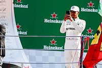 "Villain" Hamilton unfazed by Ferrari fans' booing