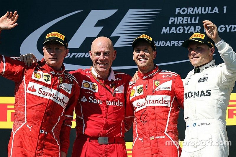 Yarış galibi Sebastian Vettel, Ferrari, ikinci sıra Kimi Raikkonen, Ferrari, üçüncü sıra Valtteri Bo