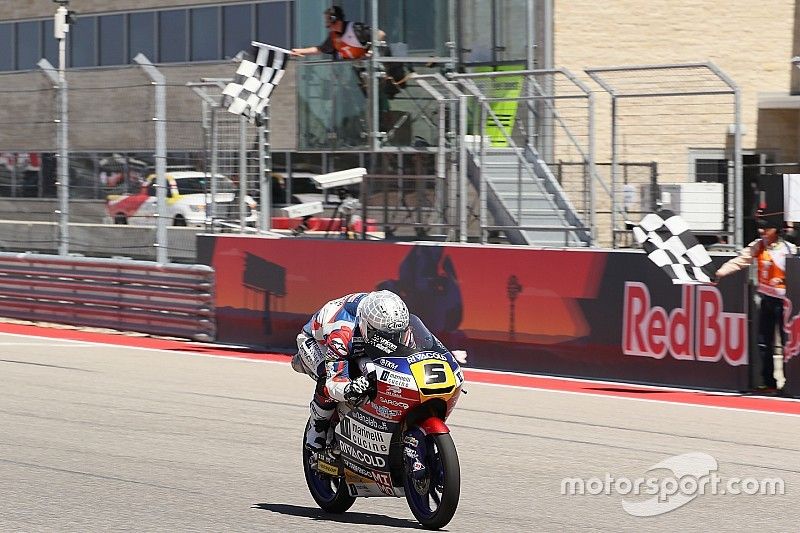 Romano Fenati, Marinelli Rivacold Snipers, takes the checkered flag