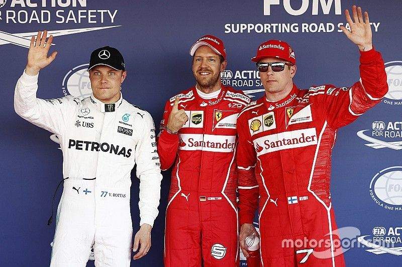 Polesitter Sebastian Vettel, Ferrari, second place Kimi Raikkonen, Ferrari, third place Valtteri Bottas, Mercedes AMG F1