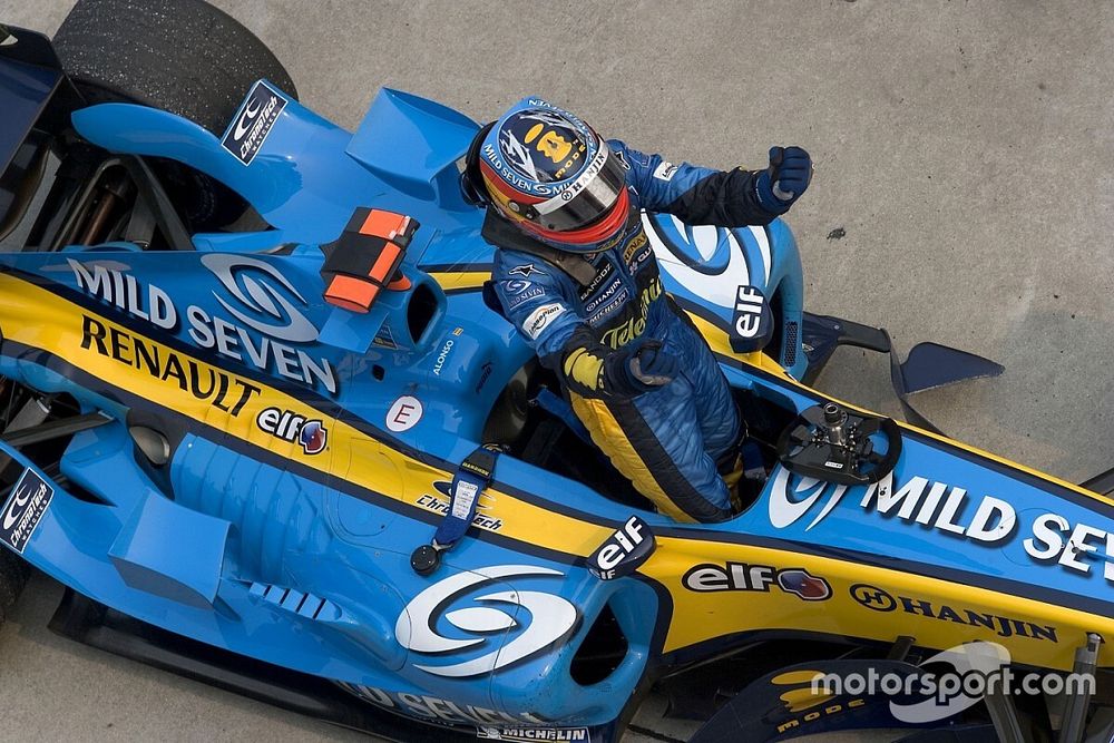 Race winner Fernando Alonso celebrates