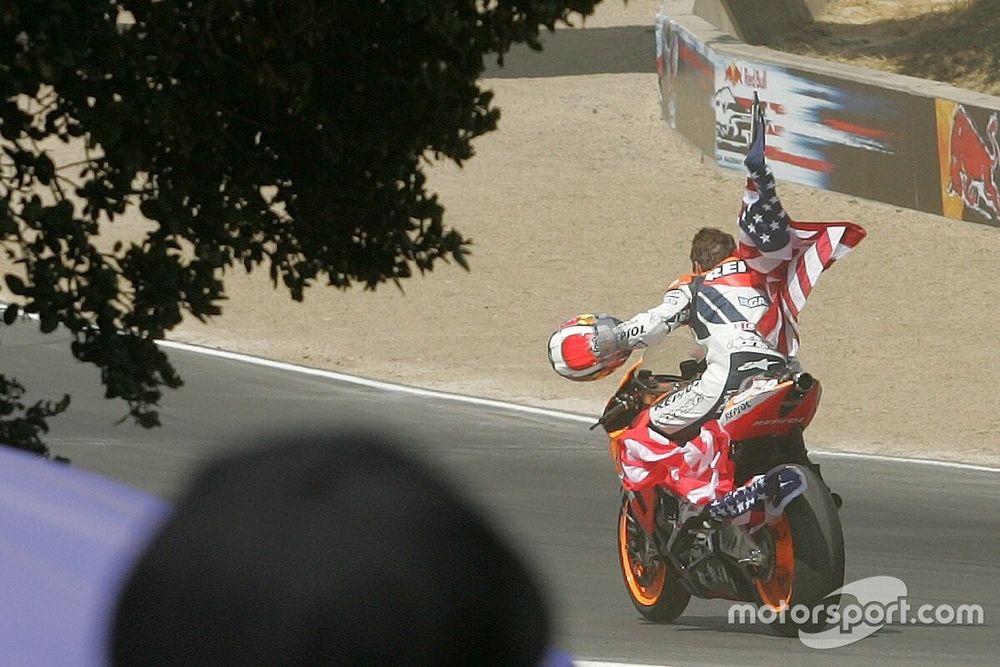 Race winner Nicky Hayden celebrates