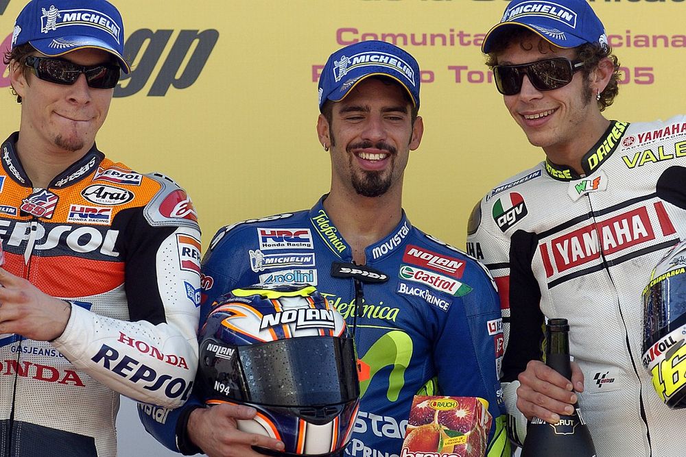 Podium: race winner Marco Melandri with Nicky Hayden and Valentino Rossi