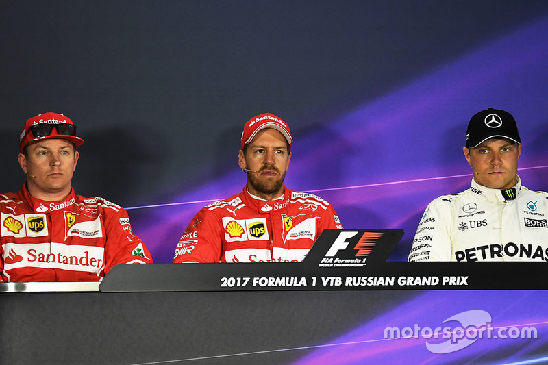 Polesitter Sebastian Vettel, Ferrari, second place Kimi Raikkonen, Ferrari, third place Valtteri Bot