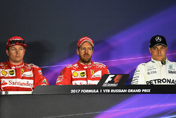Polesitter Sebastian Vettel, Ferrari, second place Kimi Raikkonen, Ferrari, third place Valtteri Bottas, Mercedes AMG F1 in the Press Conference