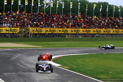 Jacques Villeneuve, Williams FW19 Renault en Michael Schumacher, Ferrari F310B