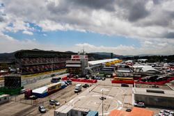 A scenic view of the Barcelona paddock, pit building and pit straight grandstand