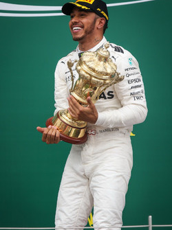 Race winner Lewis Hamilton, Mercedes AMG F1 celebrates on the podium
