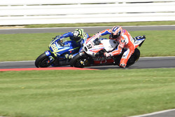 Danilo Petrucci, Pramac Racing overtakes Andrea Iannone, Team Suzuki MotoGP