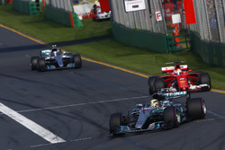 Lewis Hamilton, Mercedes AMG F1 W08, leads Sebastian Vettel, Ferrari SF70H, and Valtteri Bottas, Mercedes AMG F1 W08