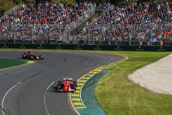 Kimi Raikkonen, Ferrari SF70H, leads Max Verstappen, Red Bull Racing RB13