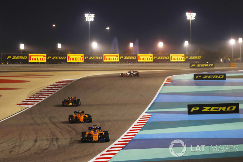 Fernando Alonso, McLaren MCL33 Renault, leads Stoffel Vandoorne, McLaren MCL33 Renault, and Max Verstappen, Red Bull Racing RB14 Tag Heuer