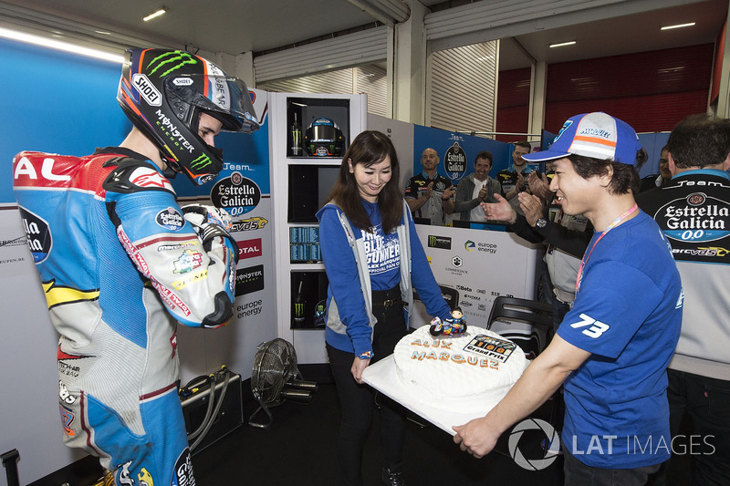 Alex Marquez presented with a cake to celebrate 100 GP starts