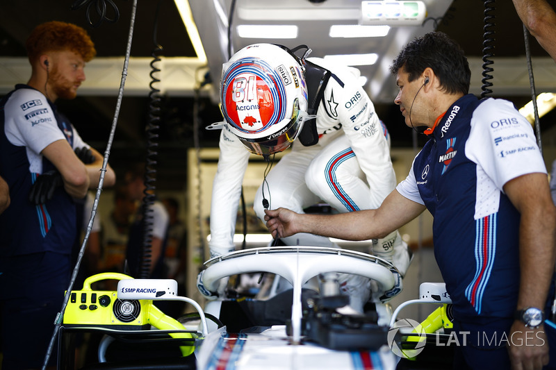 Lance Stroll, Williams Racing, enters his cockpit