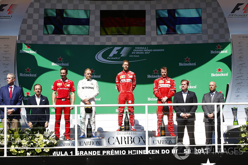 Podium: winner Sebastian Vettel, Ferrari, second place Valtteri Bottas, Mercedes AMG F1, third place Kimi Raikkonen, Ferrari