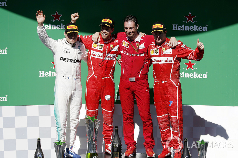 Podium: winner Sebastian Vettel, Ferrari, second place Valtteri Bottas, Mercedes AMG F1, third place