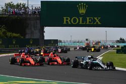 Valtteri Bottas, Mercedes-AMG F1 W09 leads Sebastian Vettel, Ferrari SF71H and Kimi Raikkonen, Ferrari SF71H at the start of the race